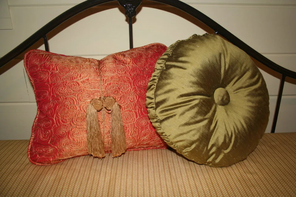 Added a tassel tie to the orange pillow, valances, shutters, bedding 