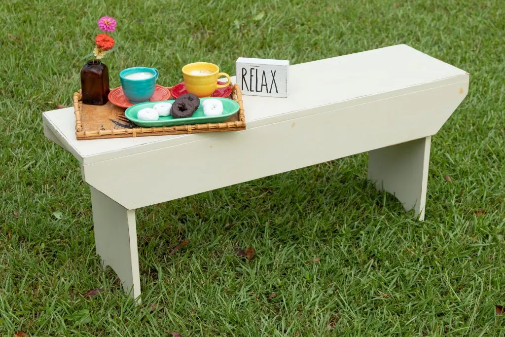 Relax for an afternoon coffee and sweet treat on this rustic bench