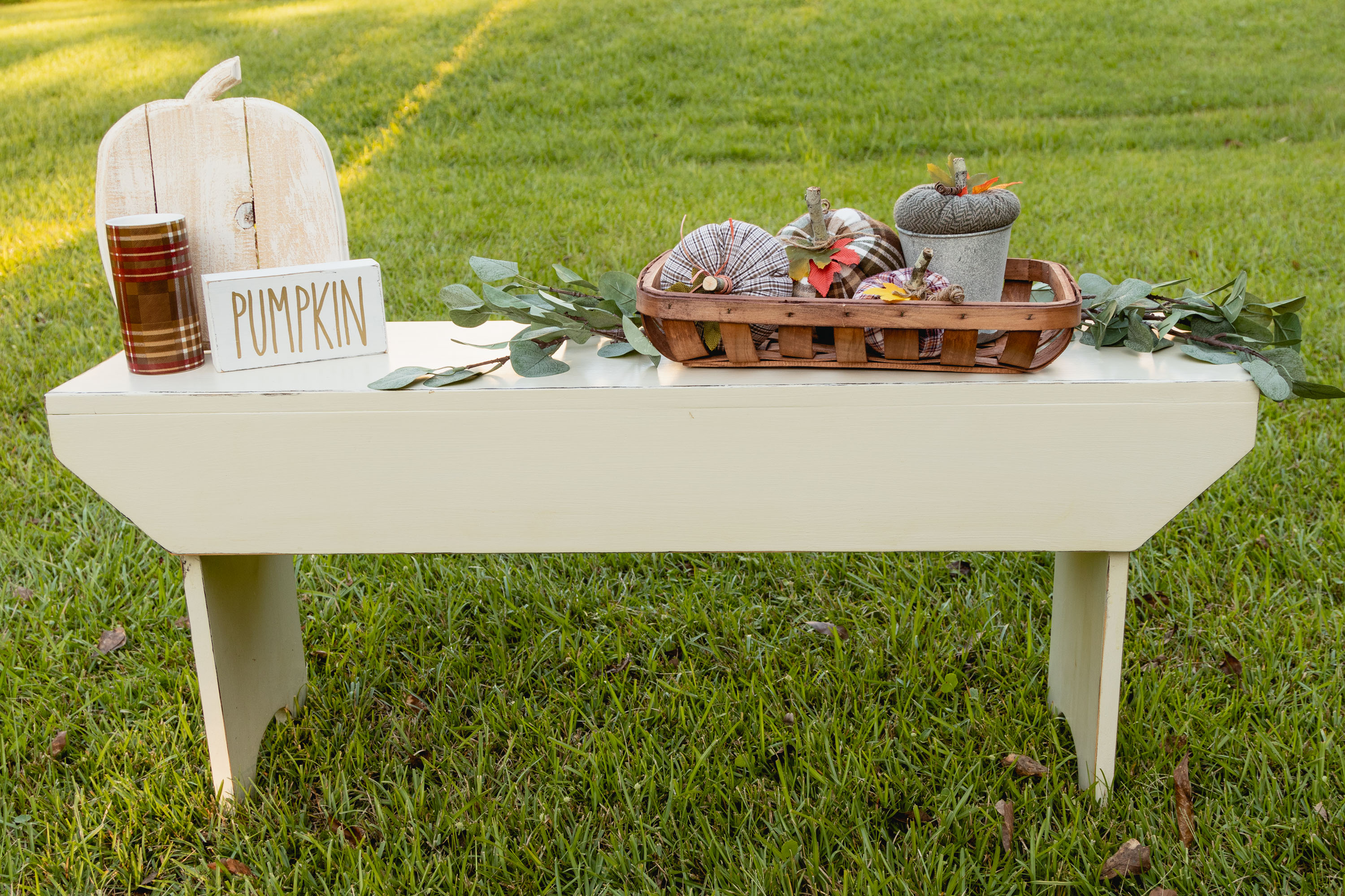One board bench for Fall. Made from one board and ready for your entry, garden, etc. One board bench for Fall