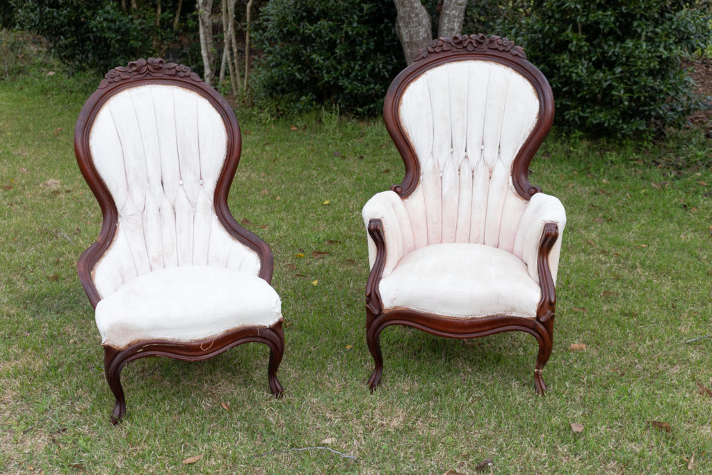 two Victorian chairs before upholstery is replaced 