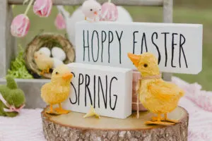 DIY Easter Decoration Spring Block Signs DIY with ducks and flowers on a table