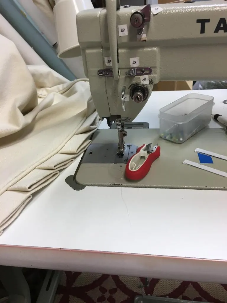 Sewing machine with a walking foot, heavy cotton twill slipcovers