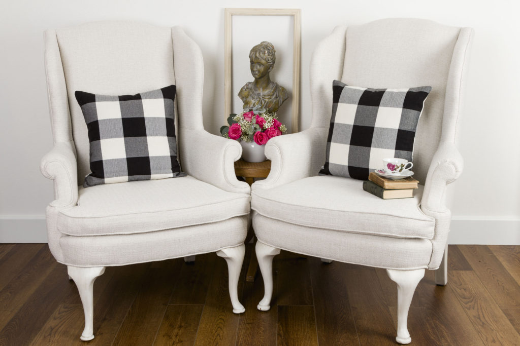 New Upholstered Wingback Chairs with Buffalo Check Pillows