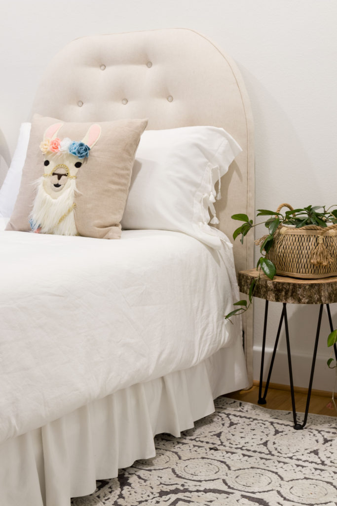 Sleeping pillow leaning against headboard