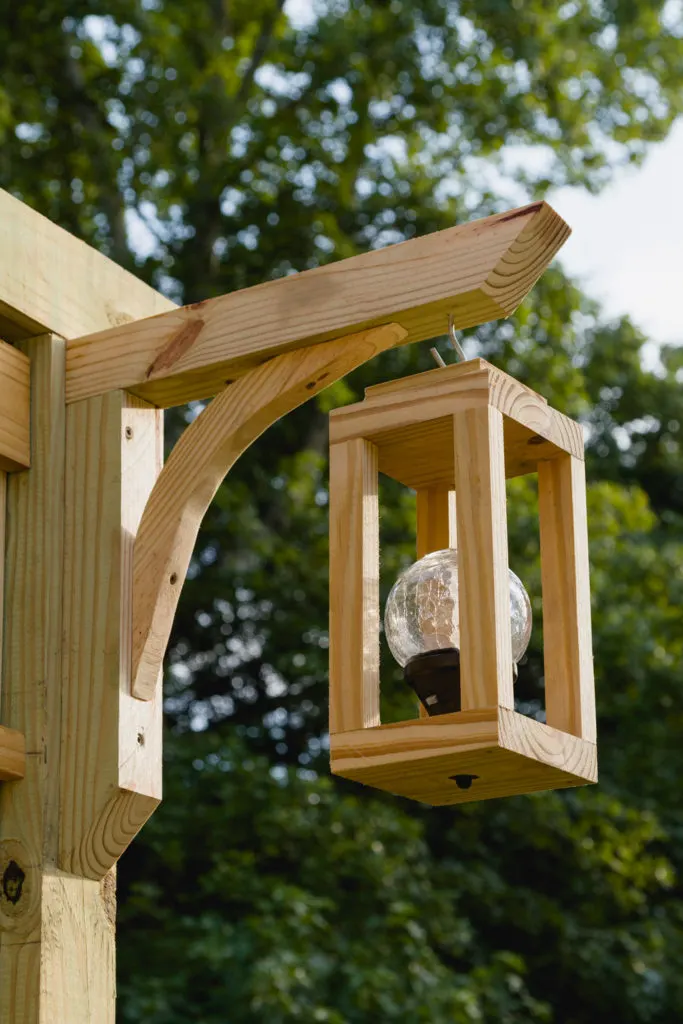 Hanging from a bracket my DIYwood Solar Lantern