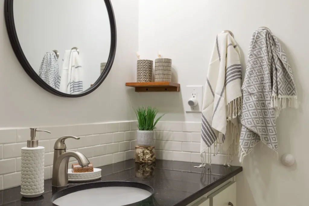 Easy bathroom remodel under $300 takes this room from sad to stunning. Learn how to achieve these easy budget friendly results... Bathroom remodel completed
