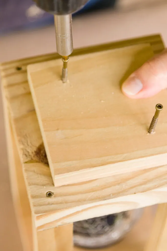 Last two screws on the top of wooden lantern