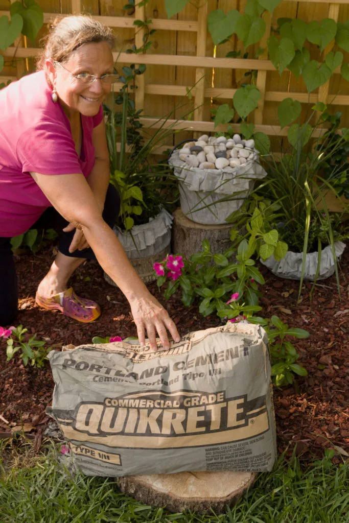 Kippi with her concrete creations (planters and water feature)