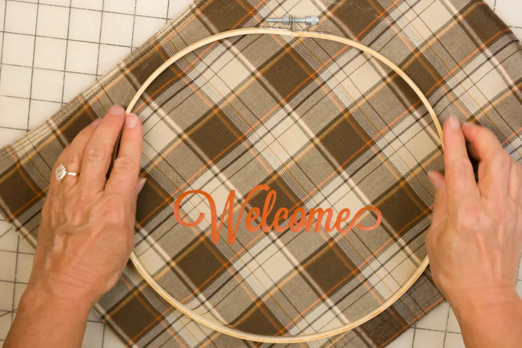 Placing the fabric in the embroidery hoop