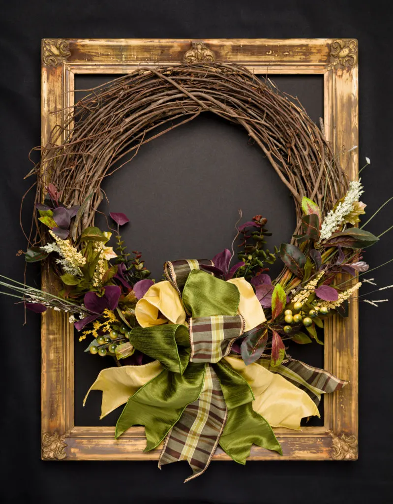 Stunning Fall Wreath with easy loop bow. Learn how to make this easy wreath with richest colors of fall. This swoon worthy wreath only took minutes to make. The stunning dupioni ribbon loop bow is the easiest bow to make and has that wow factor to delight all your guests. 10 Gorgeous wreaths to inspire your fall wreath decorating and crafting see them all... Elegant Fall Wreaths