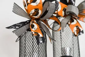 Easy Halloween Decorations to make or up-cycle, make a pretty Halloween bow, Halloween decorating ideas and step by step directions for how to make a bow Halloween lanterns with bows