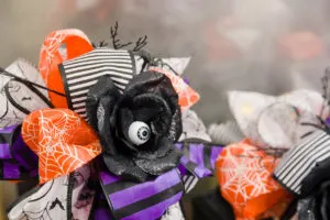 Spooky cute Halloween Dollar Tree Ribbon bows on my handmade lanterns. These cuties will bring a smile to everyone who visits. Video and step by step directions so you can easily craft some today. DIY Easy Halloween Decorations save money and time making these and more... Spooky cute Halloween Dollar Tree Ribbon bows