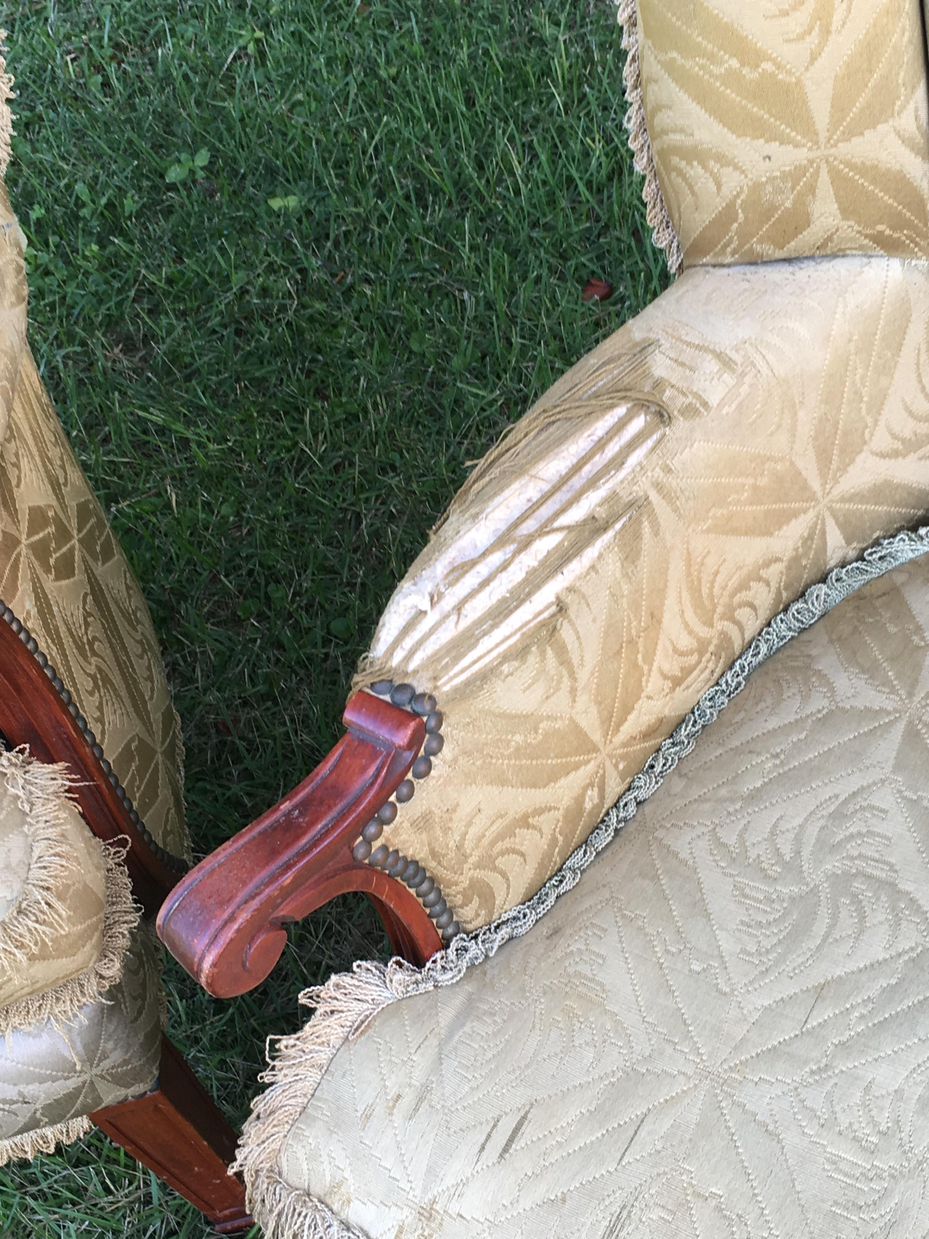 Worn upholstery on chair arms and seat Kippi at Home