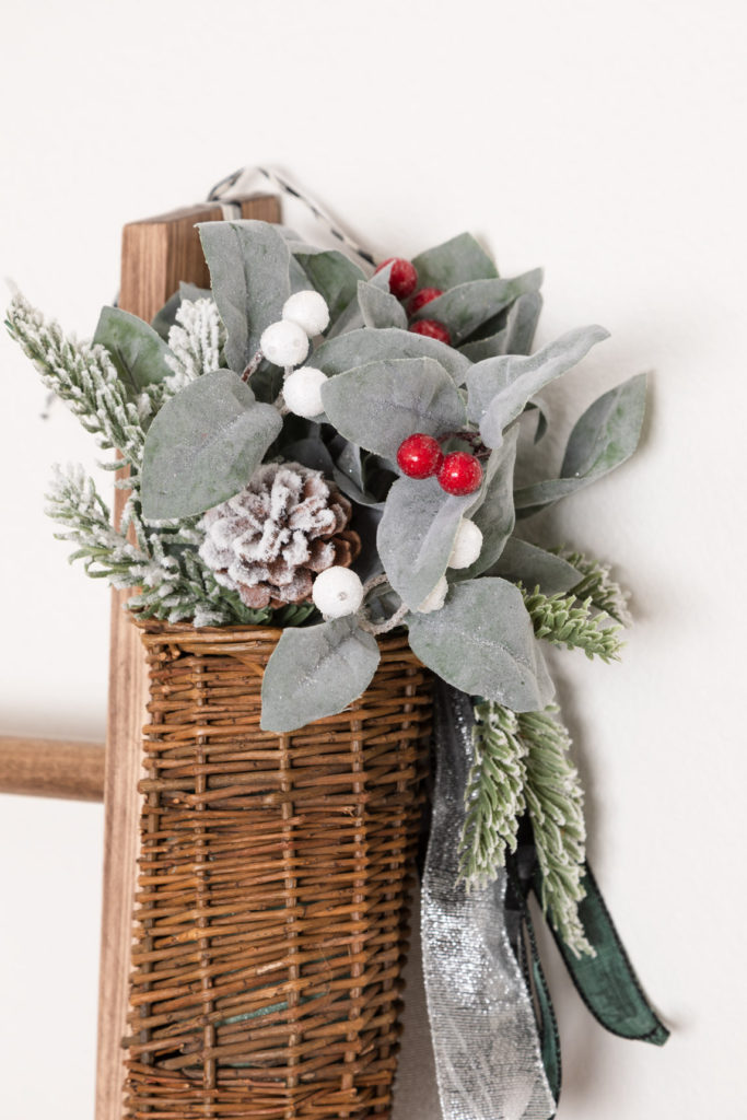 Willow basket with Christmas floral and ribbons 