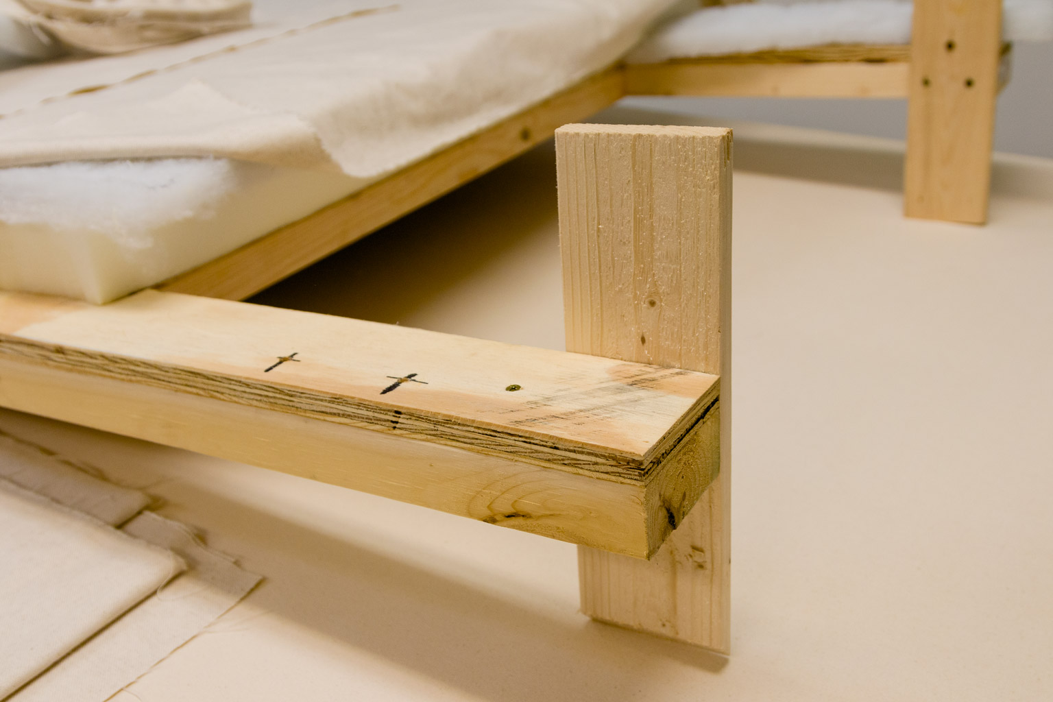 Headboard legs before covering them with Dacron and fabric Kippi at Home