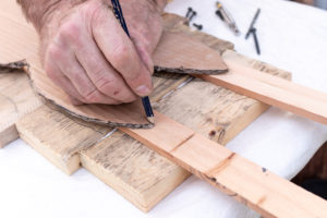 Tracing the top of the bunny ears on battens with a pencil