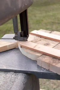 Cutting out the bunny with a band saw following all the pencil lines