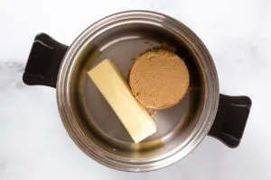 Heat butter and brown sugar in a saucepan