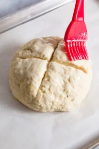 Brush dough with buttermilk and butter 