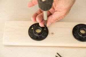 Attaching the pipe hook flange to the finished lumbar Attaching the pipe hook flange to the finished lumbar