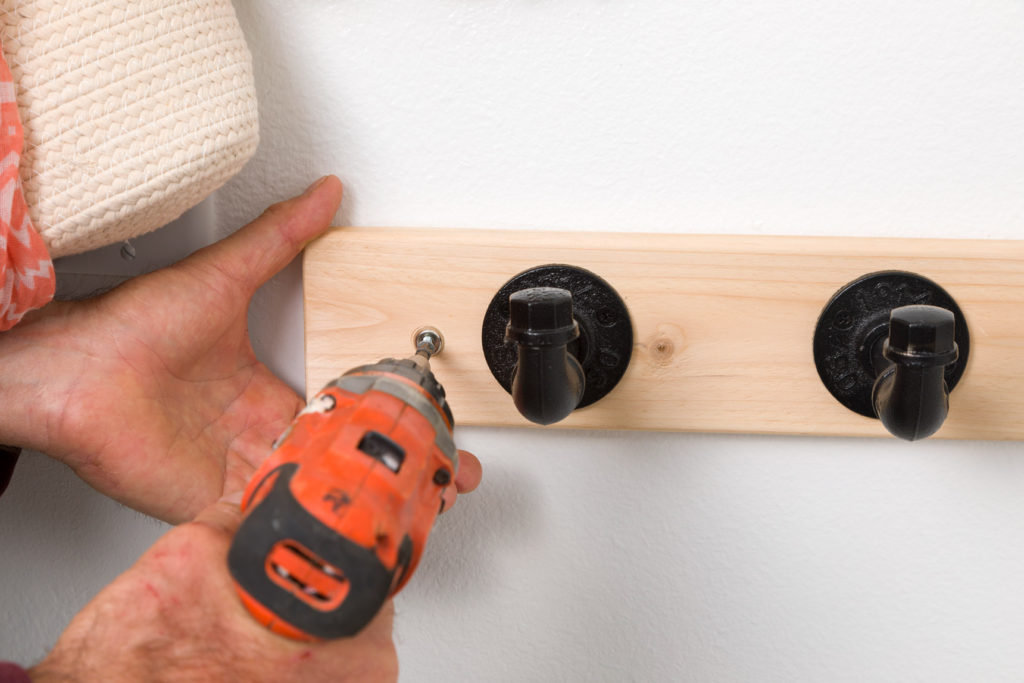 Installing wall hooks with scews