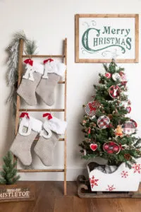 Quilt ladder with handmade Christmas stockings