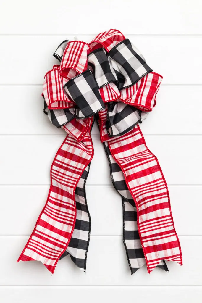 Gingham Checkered Red And White Bow Made Of Ribbon Stock Photo