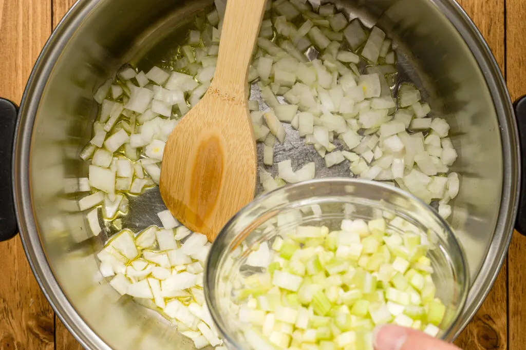 Adding chopped celery