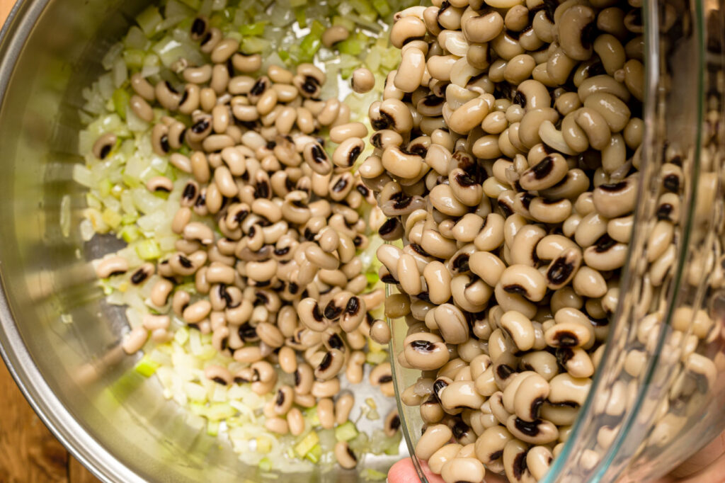 Adding soaked black-eyed peas