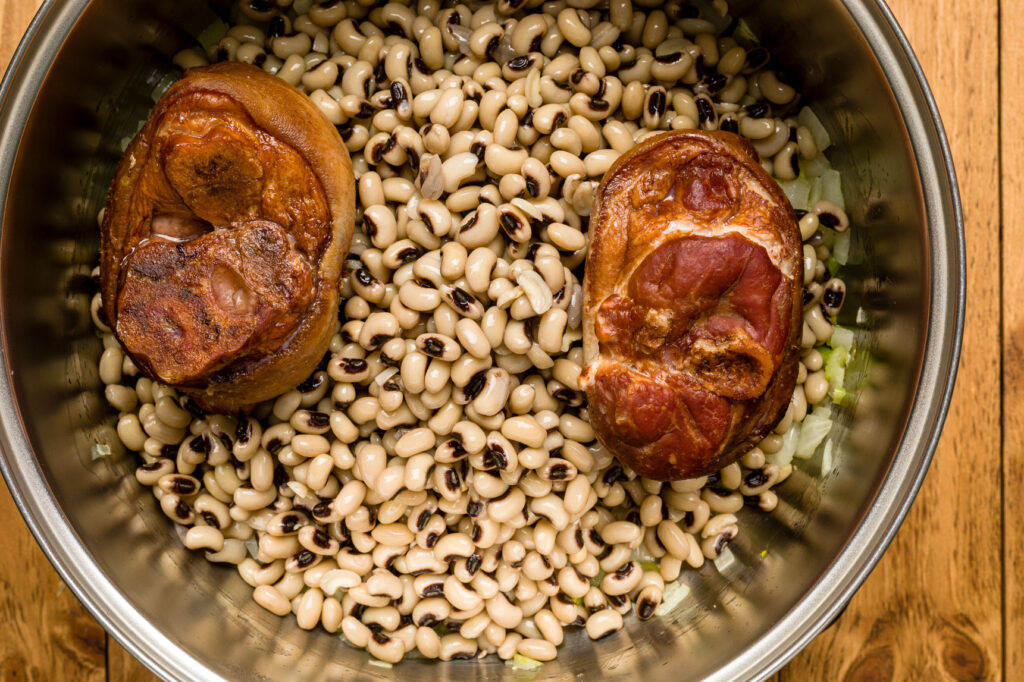 Place ham hocks in the pan