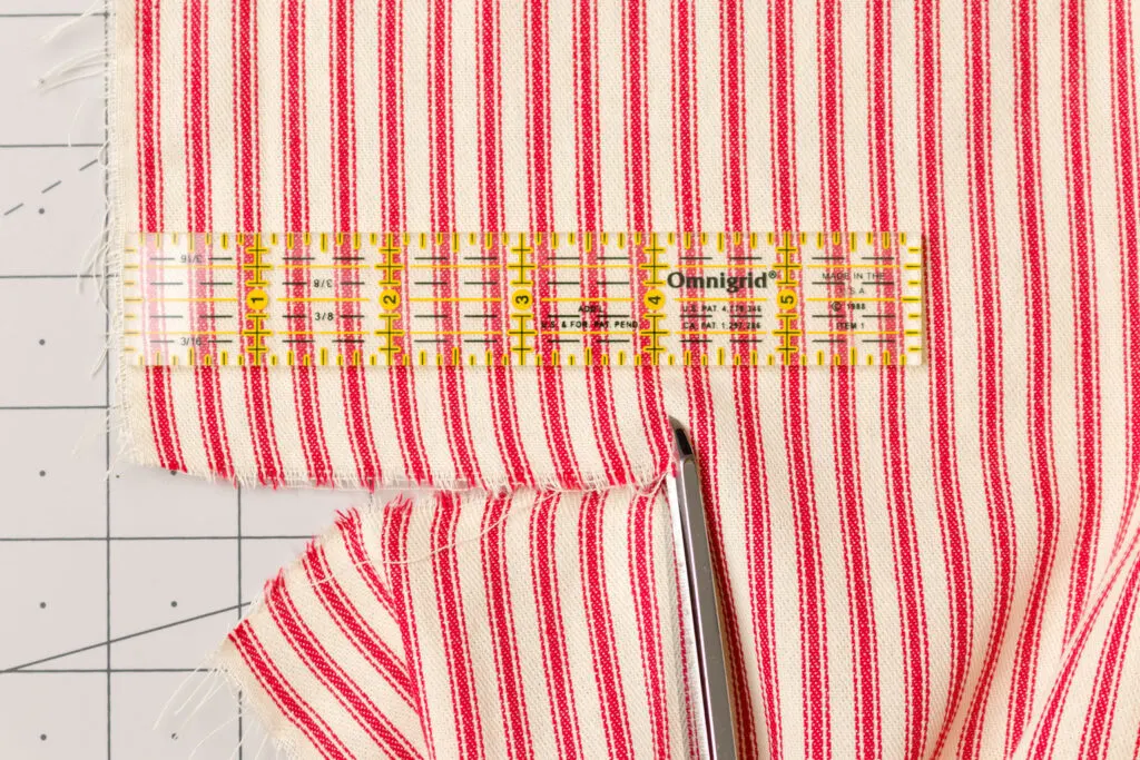 Clip flag fabric at cut marks