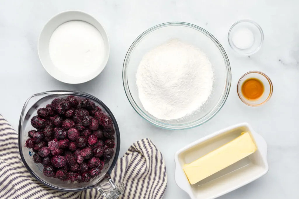 Blueberry Crisp ingredients in seperate bowls 