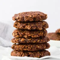 Chocolate no bake cookies stacked on a table