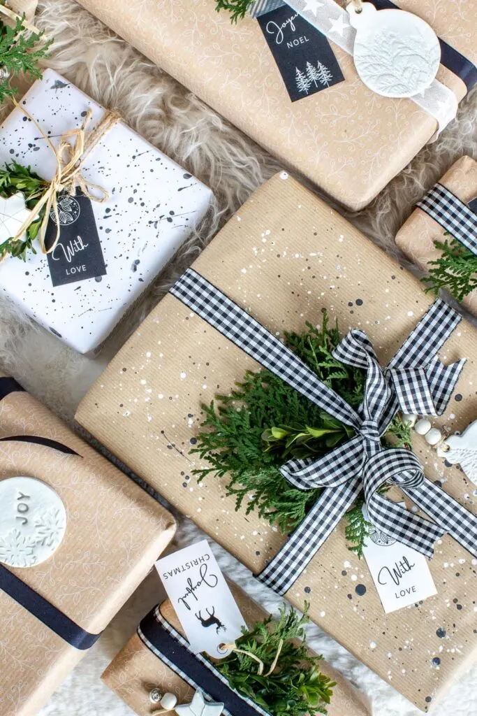 tan and white craft paper gift wrapping with checked ribbon bows on a table