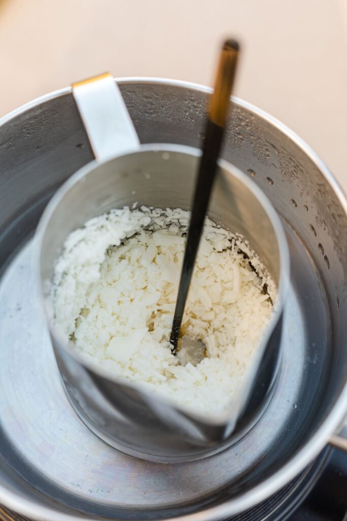 Gently Stir wax in melting pot as it melts 