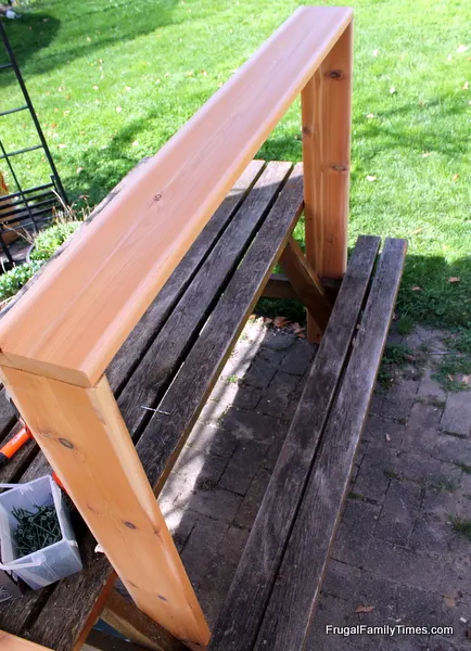 raised garden bed being assembled