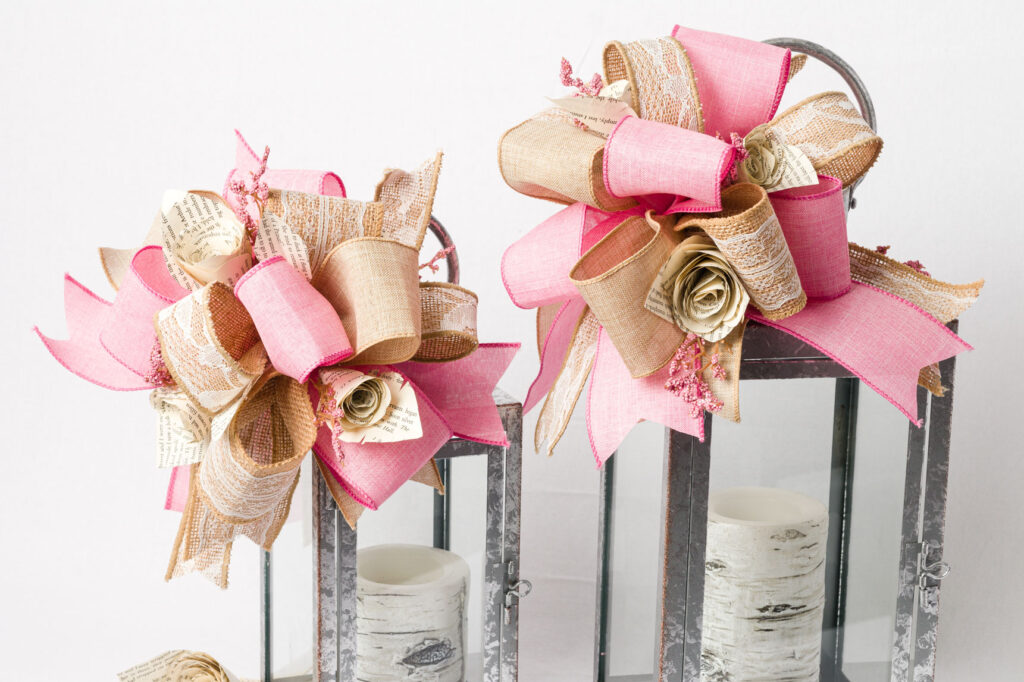 Lanterns with multi ribbon bow and paper roses 