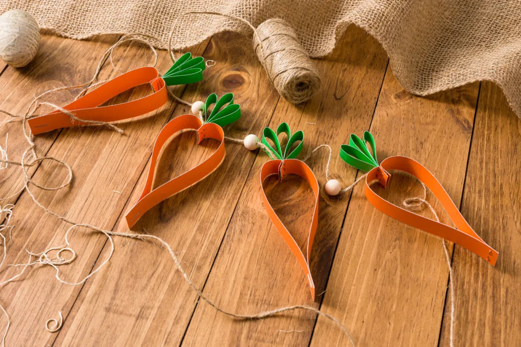 Carrot Garland Carrot garland on a wood table with burlap