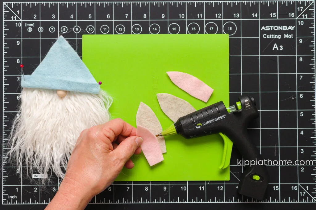 Attaching the inner ears on a silicone mat