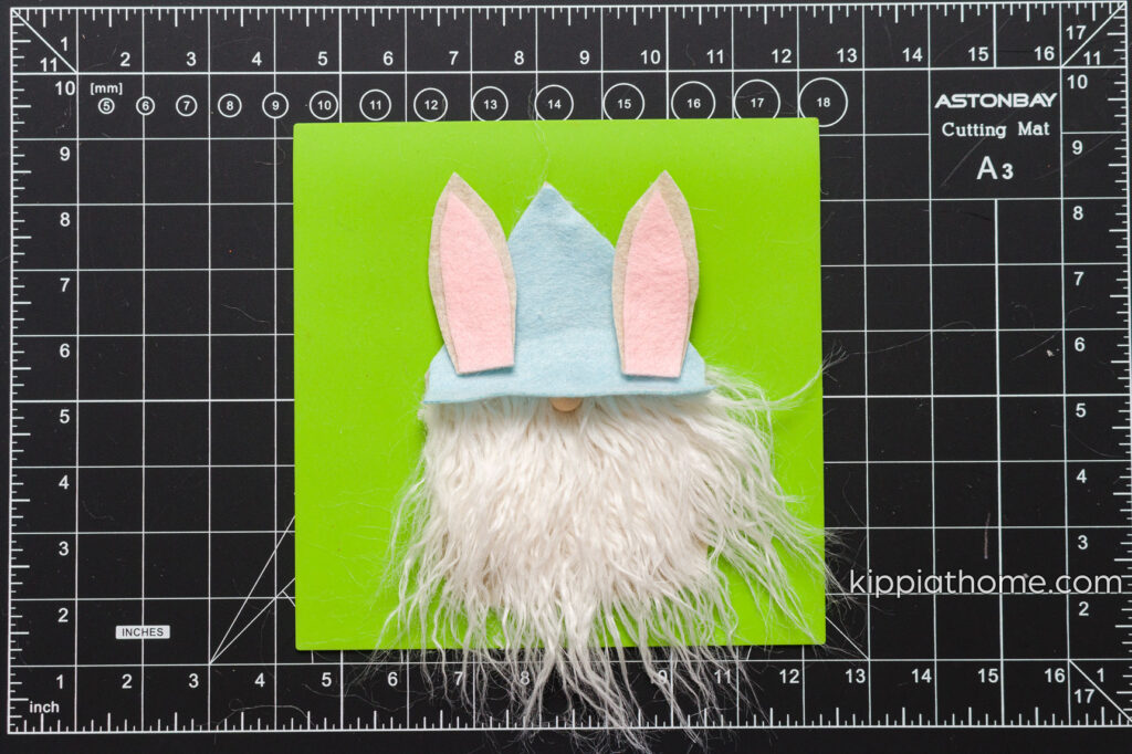 Attach ears to gnome hat