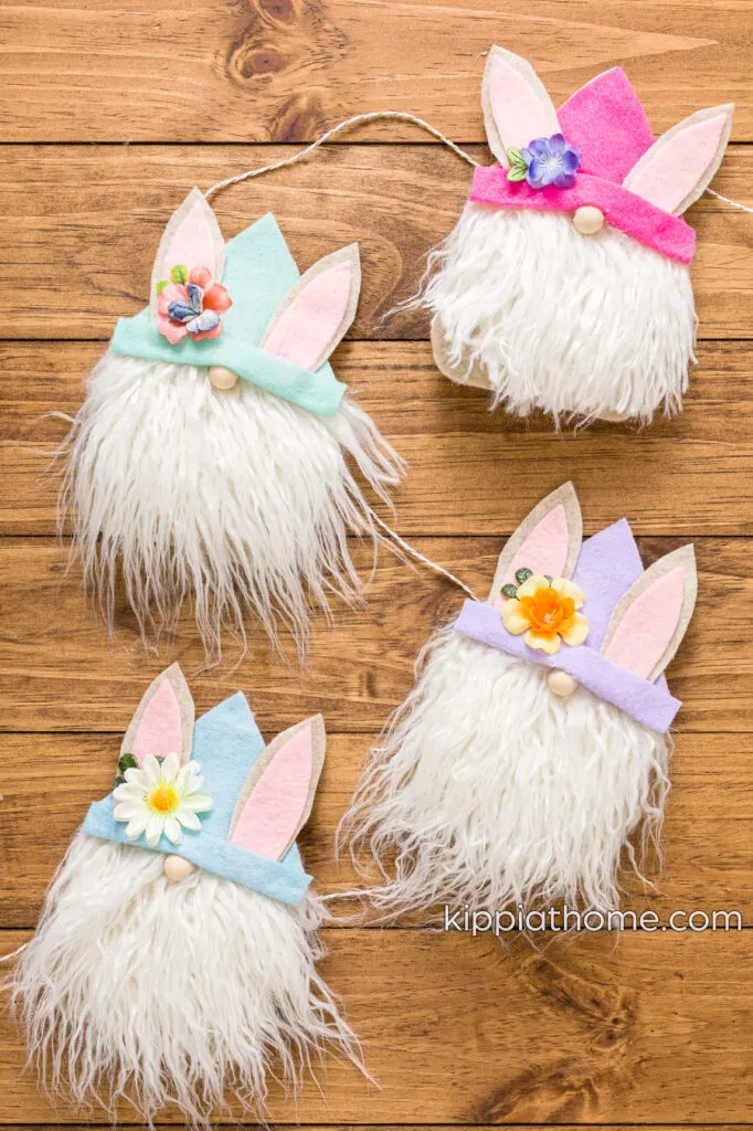 Easter Gnomes four Easter Gnomes on a wood table with bakers twine