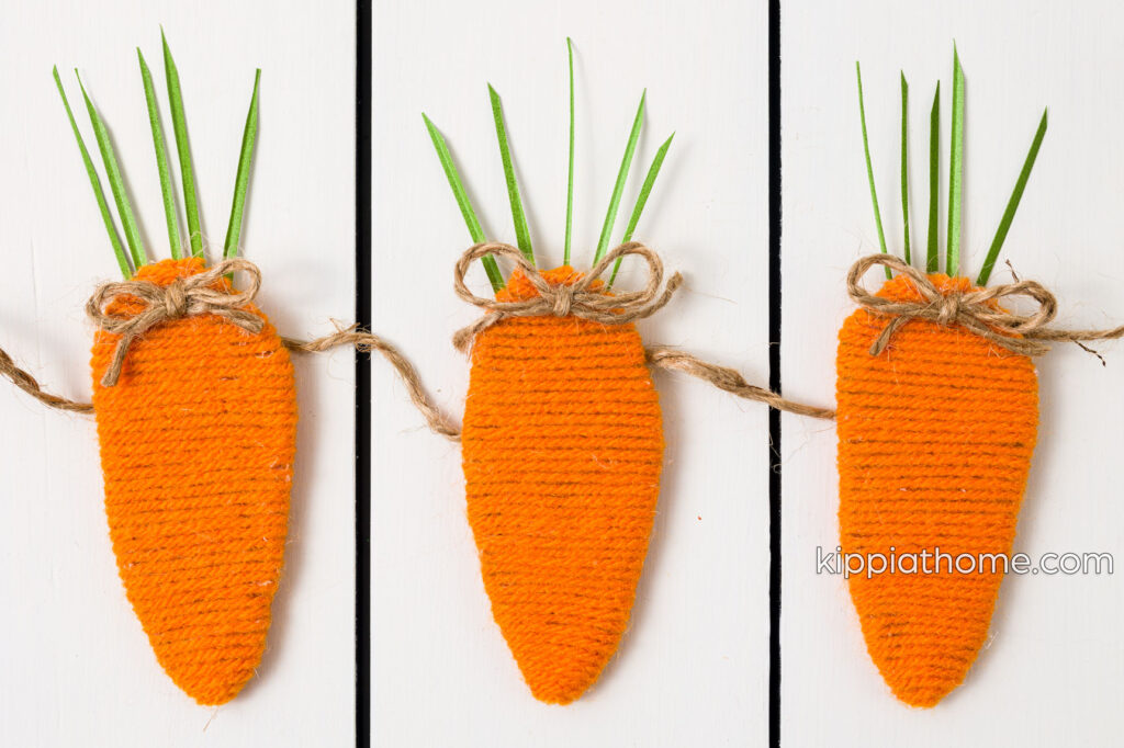 Carrot garland on a white table