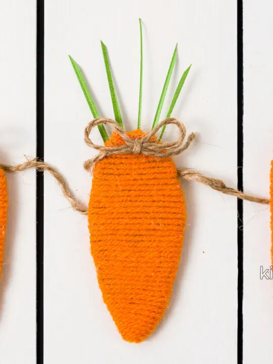 Carrot garland on a white table