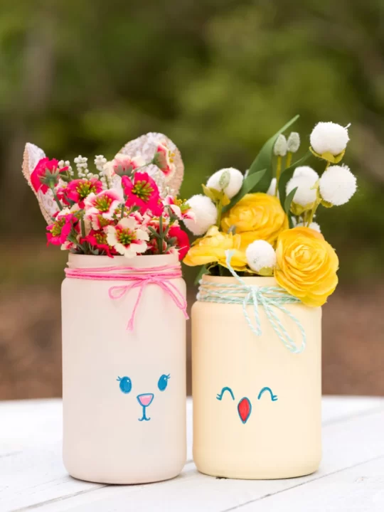 Easter Chalk Painted Jars filled with flower and a baker's twine bow