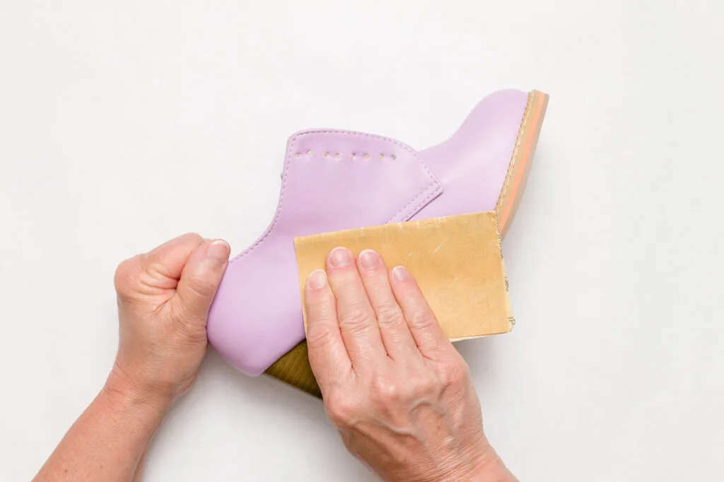Sanding the shoe on a craft mat
