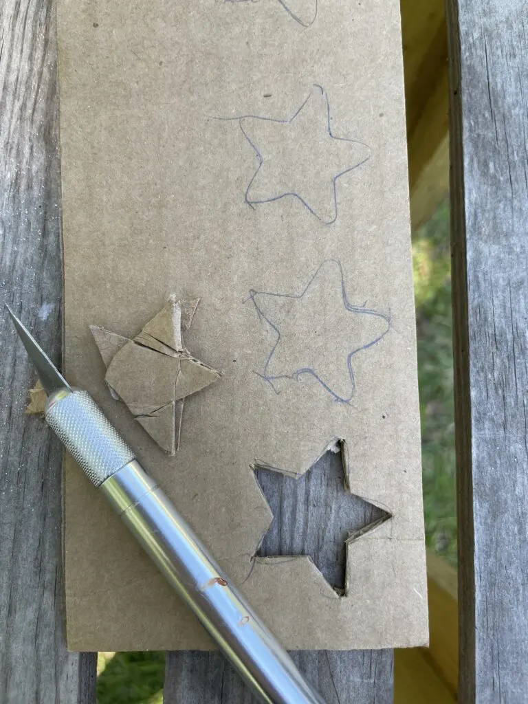 Cut out the stars with a craft knife
