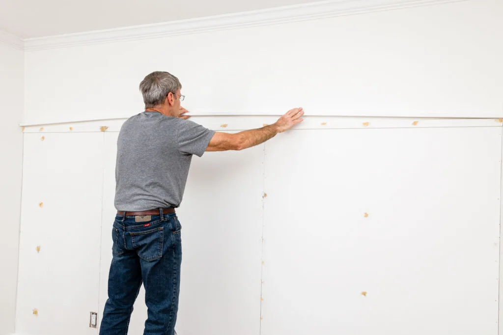 Positioning the top board (trim) on the accent wall