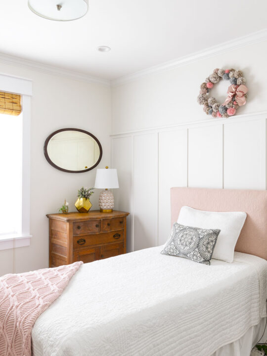 guest bedroom, pink headboard, DIY accent wall, white bedding