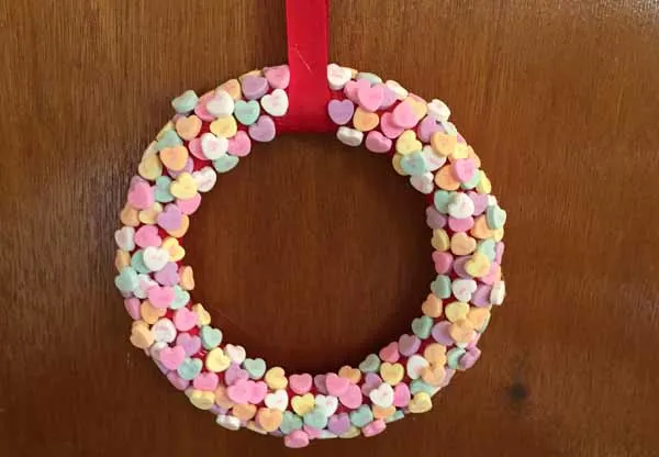 Candy hearts wreath with red ribbon