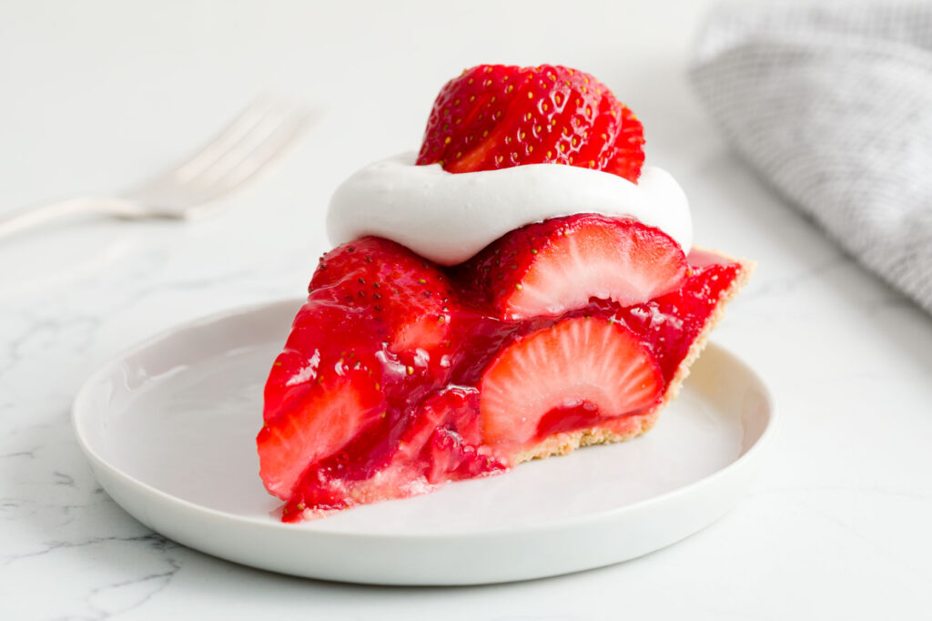 Slice of Strawberry Pie on a plate